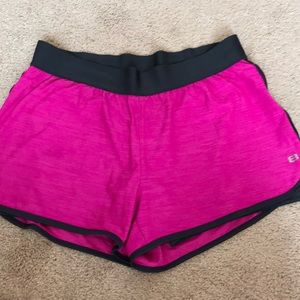 Running shorts with fitted shorts underneath